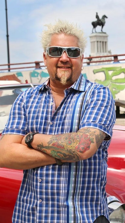 Our Podcast Explores The History Of Guy Fieri & 'Diners, Drive-Ins, & Dives'